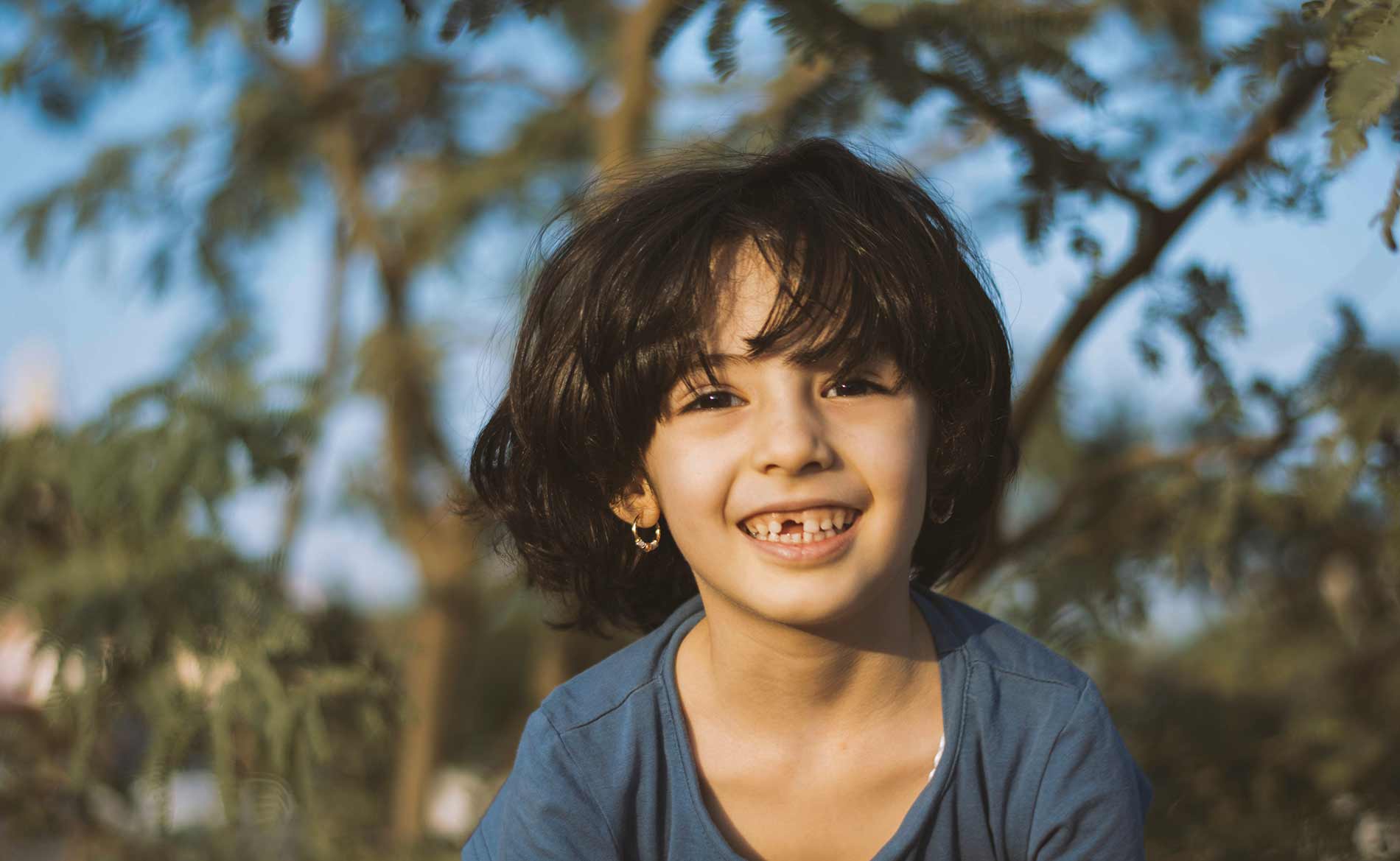 Child Outside Smiling